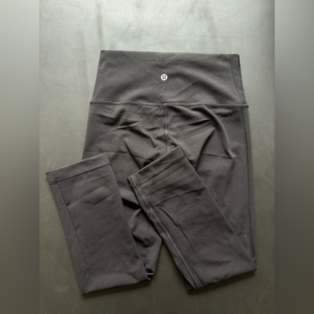 Lightly used- LuluLemon size 4 black wunder under material, cropped length